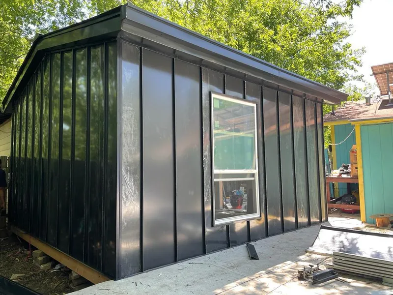 Black standing seam metal wall panels for Metal Roof Installation in Osceola